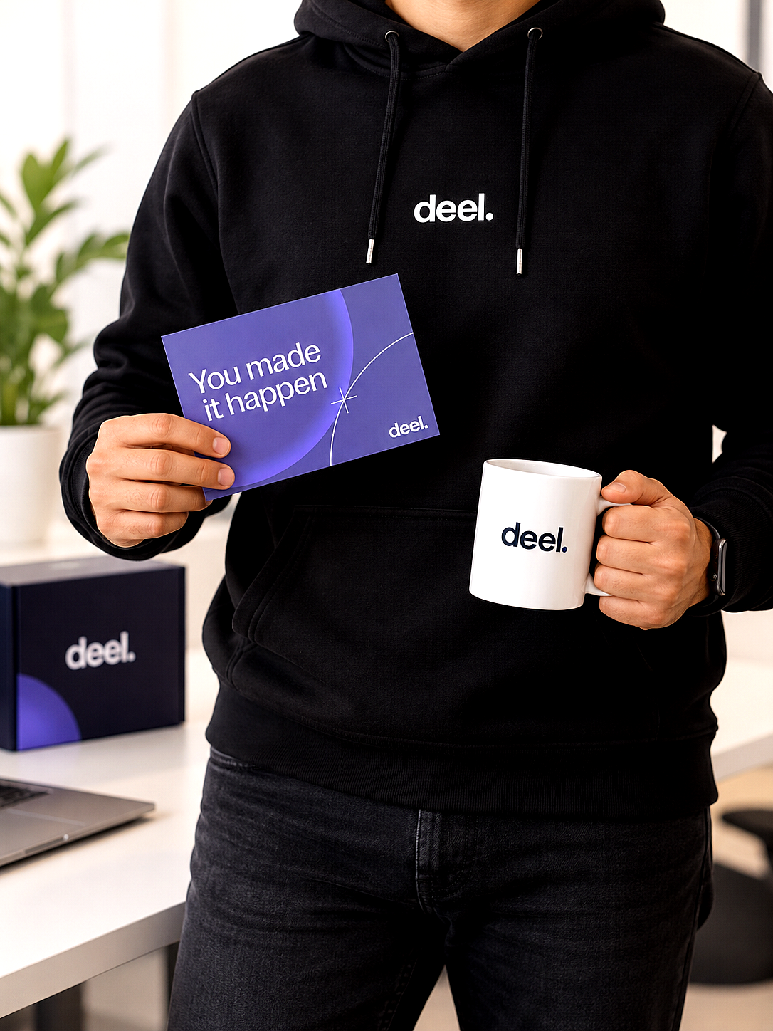 Deel: Streamlining Global Payroll & Contractor Payments 4 Black Deel hoodie displayed with a purple appreciation card, part of the gift received by ClickTN.